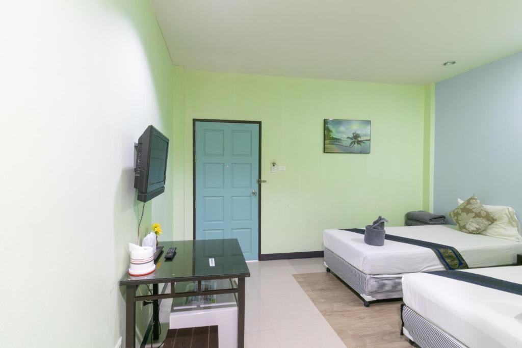 TV a/nebo společenská místnost v ubytování Chaiyo Resort