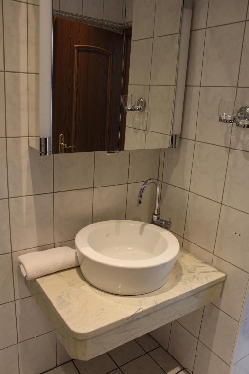 Koupelna v ubytování Landhaus Oltmanns