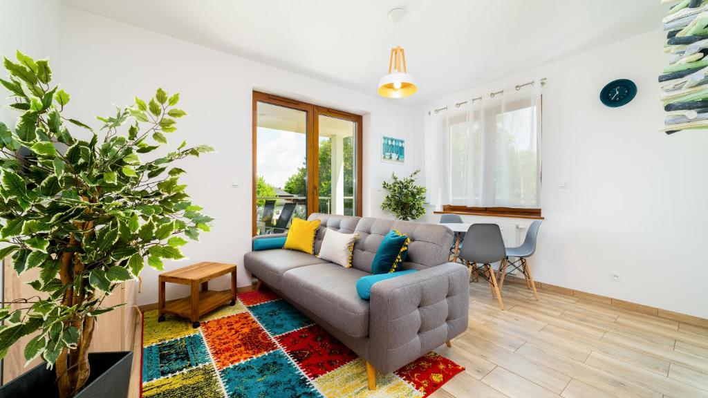 Posezení v ubytování Ogrodnicza, Sun & Snow