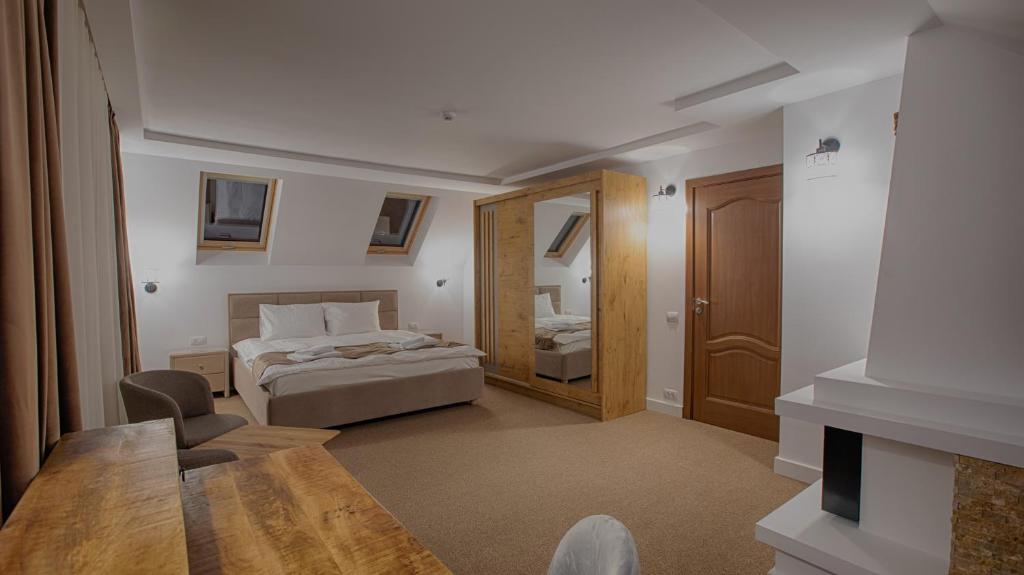 Postel nebo postele na pokoji v ubytování MER Guest House B&B