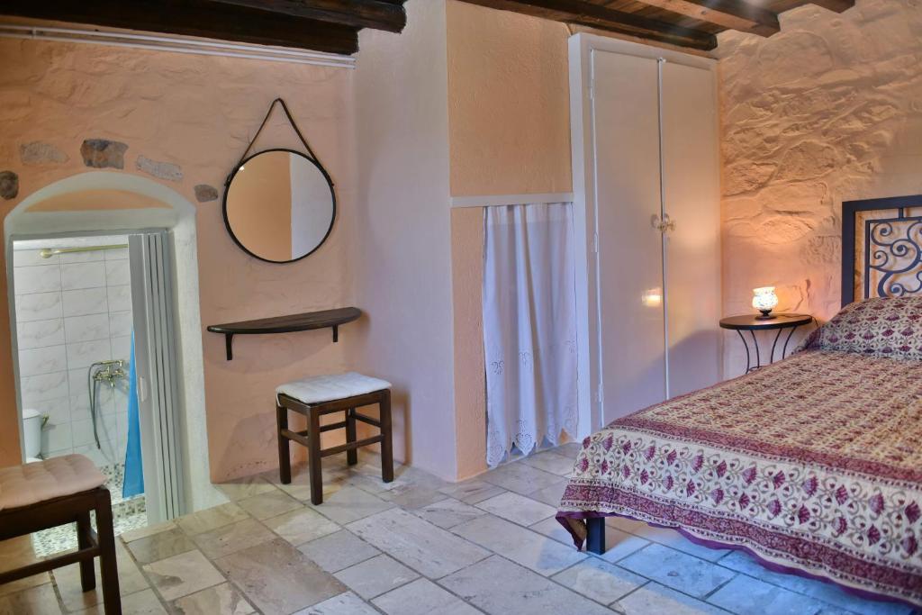 Postel nebo postele na pokoji v ubytování Arbeli house