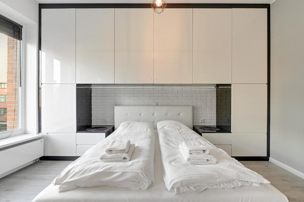 Postel nebo postele na pokoji v ubytování Comfort Apartments Rajska