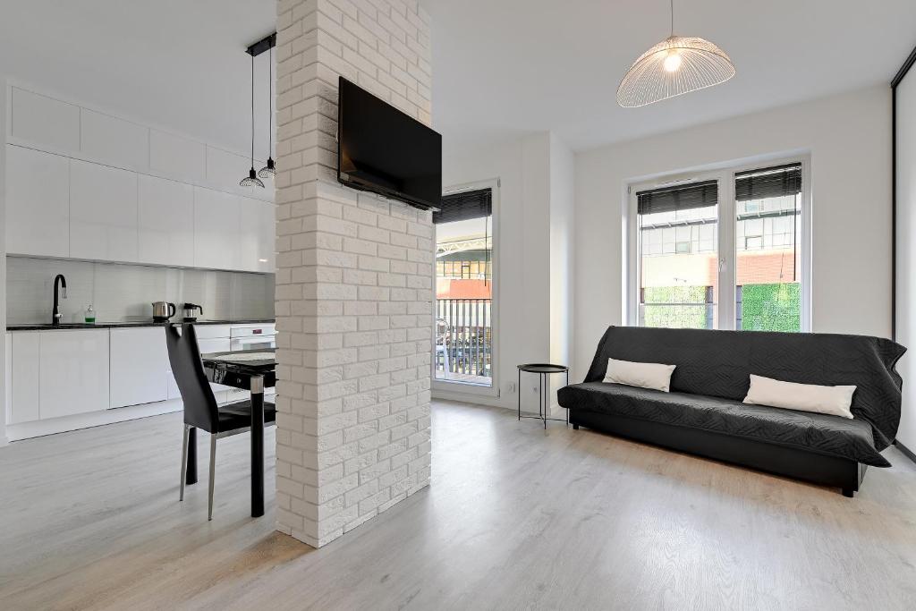 Kuchyň nebo kuchyňský kout v ubytování Comfort Apartments Rajska