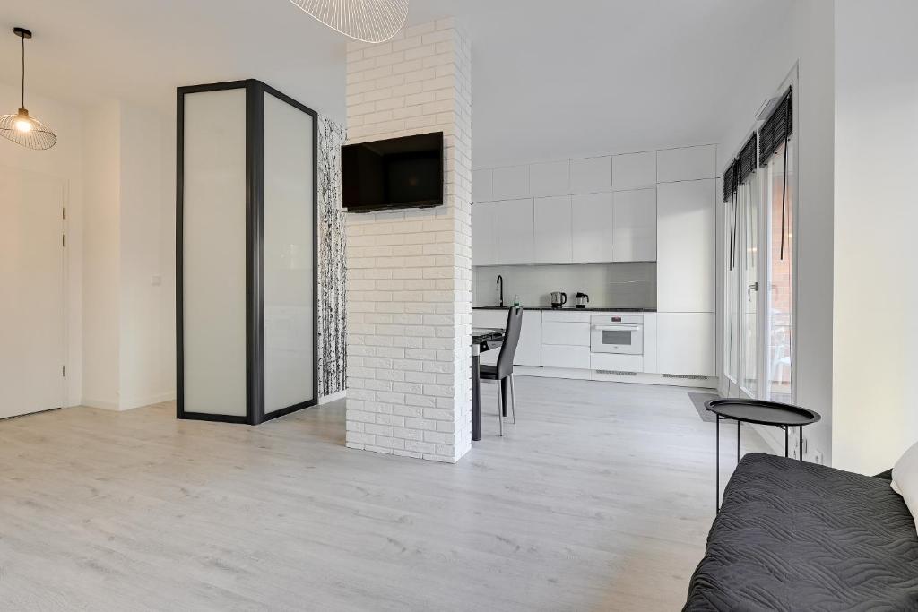 Kuchyň nebo kuchyňský kout v ubytování Comfort Apartments Rajska