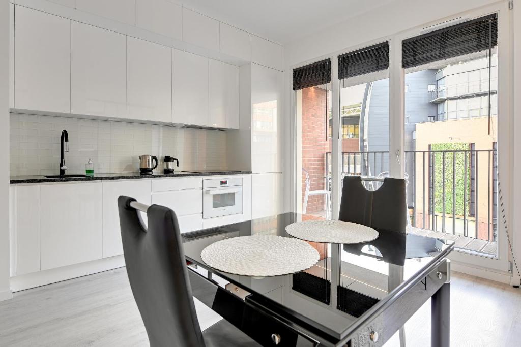 Kuchyň nebo kuchyňský kout v ubytování Comfort Apartments Rajska