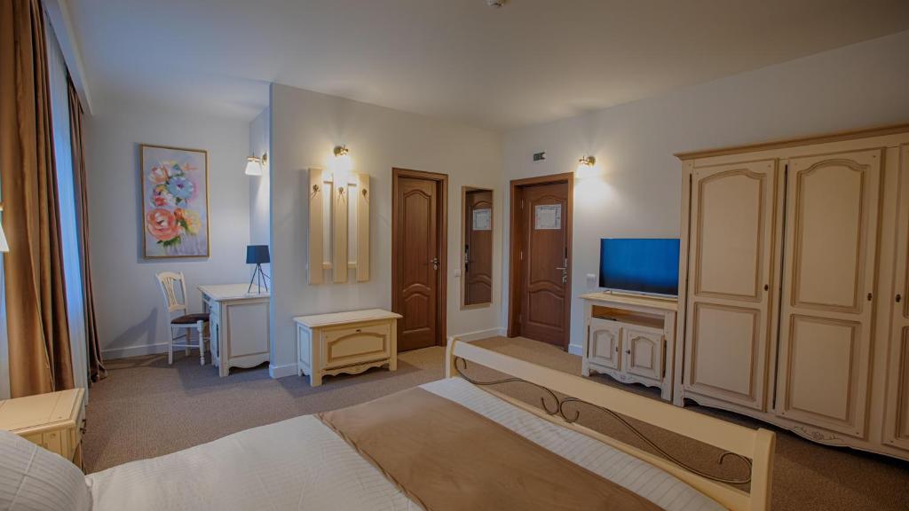 TV a/nebo společenská místnost v ubytování MER Guest House B&B
