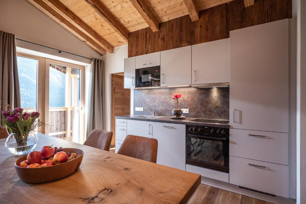 Kuchyň nebo kuchyňský kout v ubytování Apartments Zauberberg