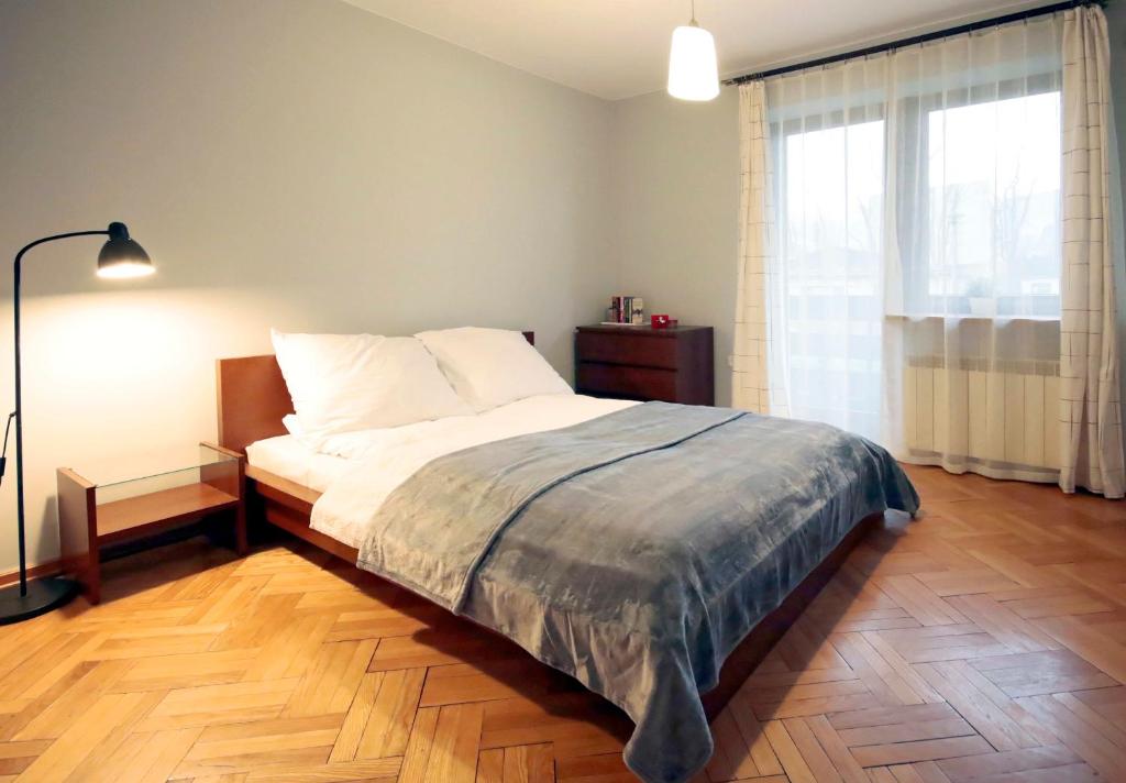 Posteľ alebo postele v izbe v ubytovaní Apartament Łukaszówki