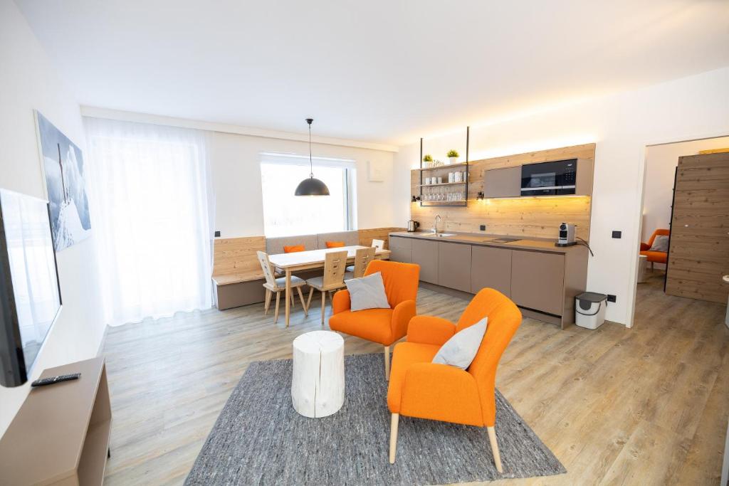 Kuchyň nebo kuchyňský kout v ubytování ALPRIMA Aparthotel Hinterstoder
