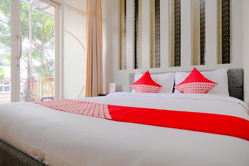 Cama o camas de una habitación en OYO 2376 Tiara Residence Syariah