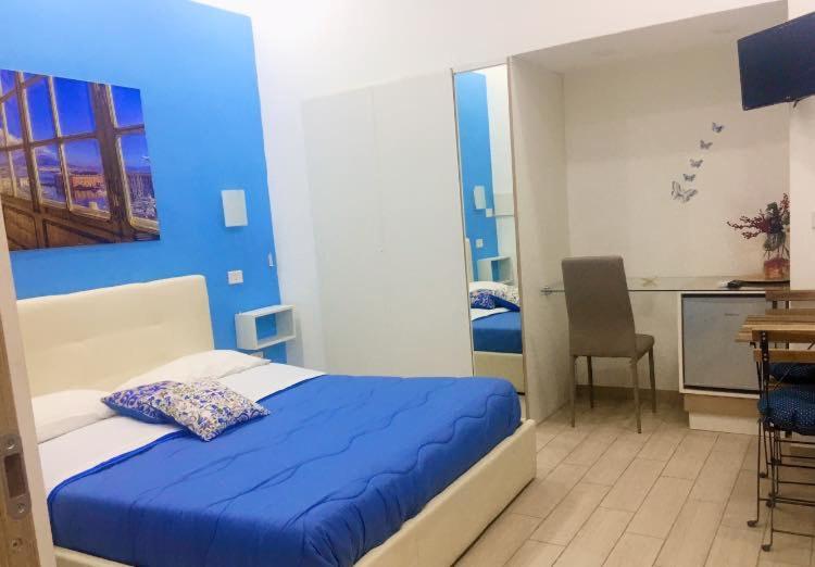 A bed or beds in a room at Decumani Prestige