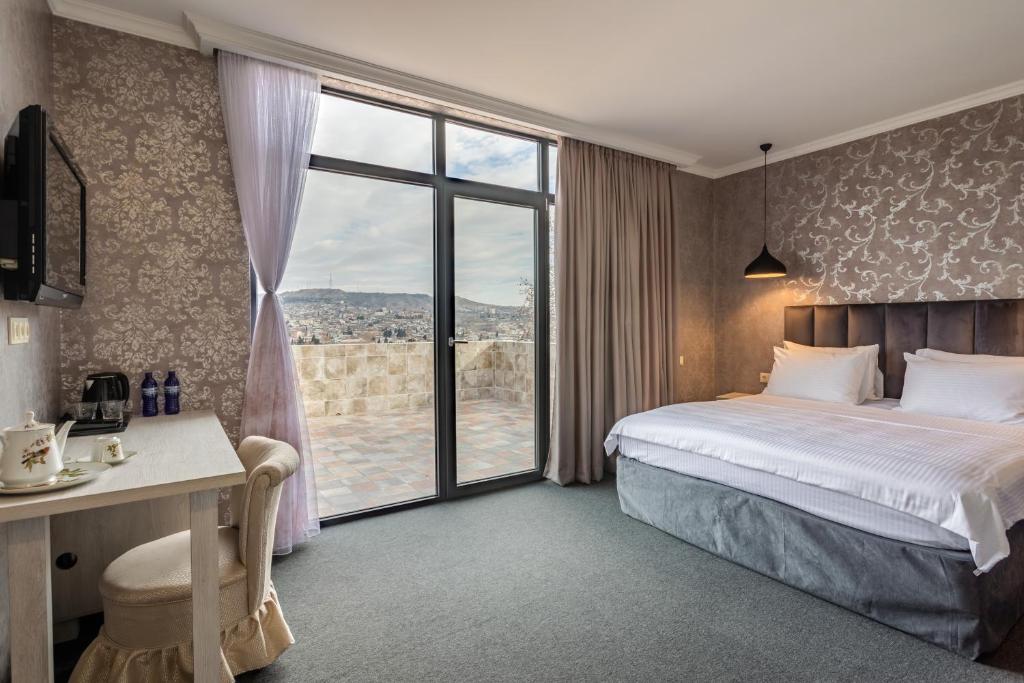 Postel nebo postele na pokoji v ubytování Hotel Day Inn