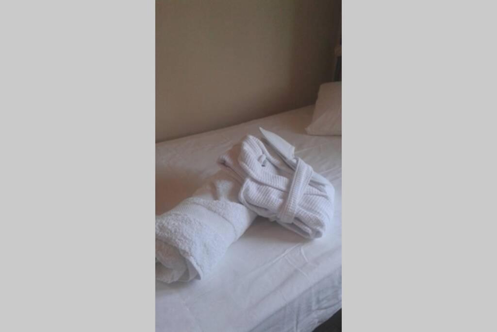 Posteľ alebo postele v izbe v ubytovaní NIKIS SEASIDE HOUSE