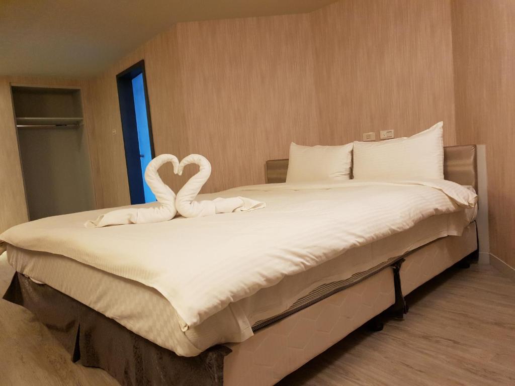 Voodi või voodid majutusasutuse Walker Hotel - Sanchong toas