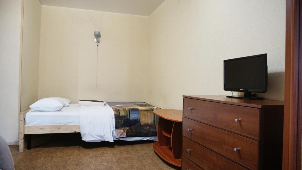 TV a/nebo společenská místnost v ubytování Doba In Ua Hoholya Apartments