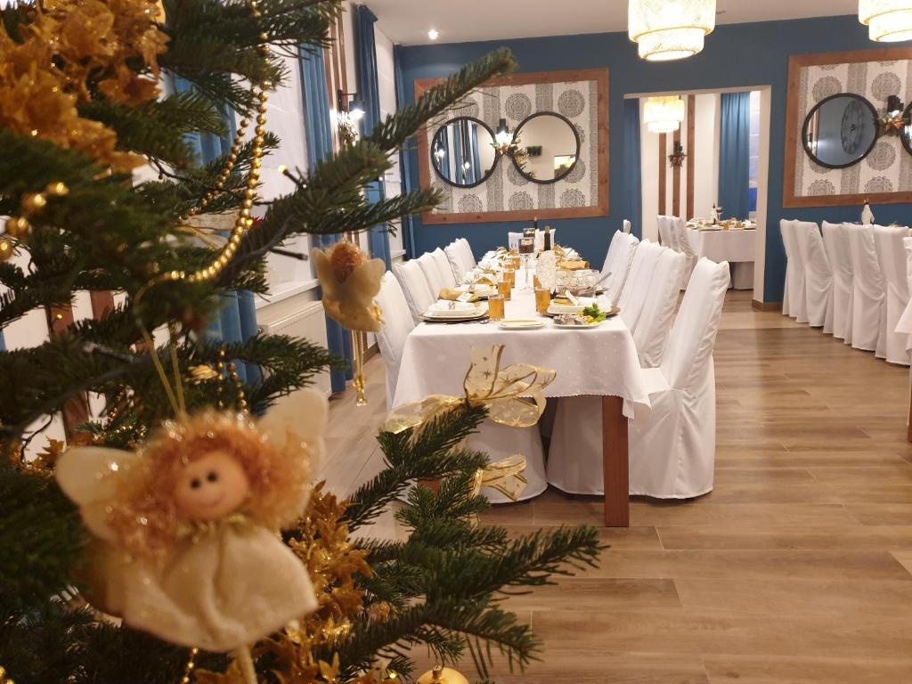 Reštaurácia alebo iné gastronomické zariadenie v ubytovaní OW Sorrento