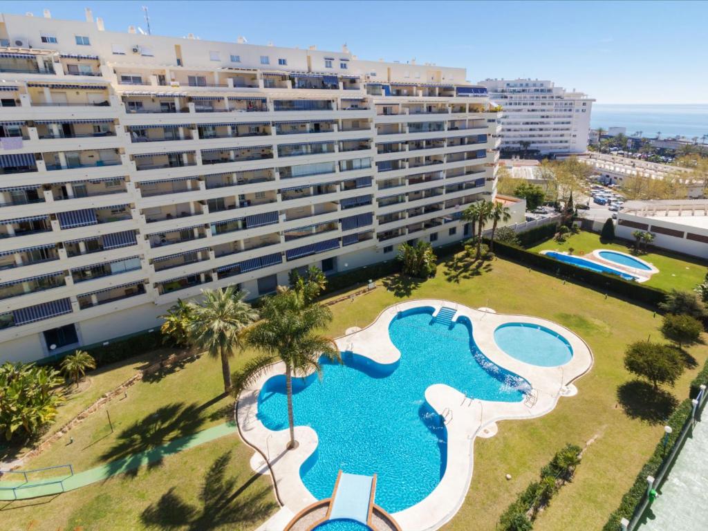 an aerial view of a large building with a swimming pool at Apartment Las Terrazas by Interhome in Marbella