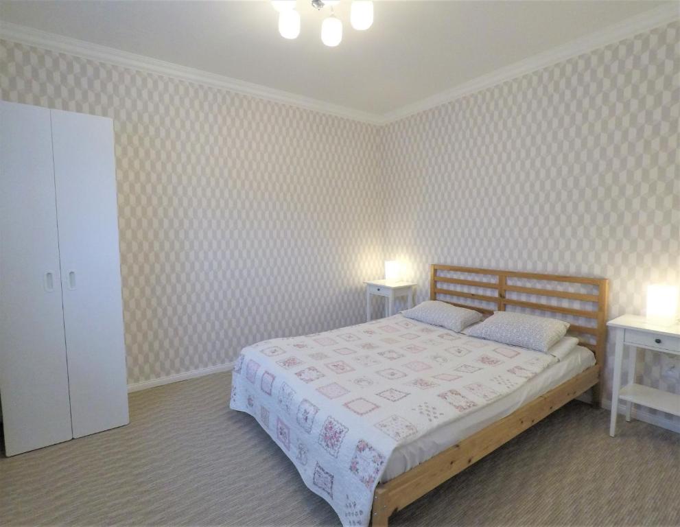 Posteľ alebo postele v izbe v ubytovaní Apartamenty Dobranoc - Wawer 2