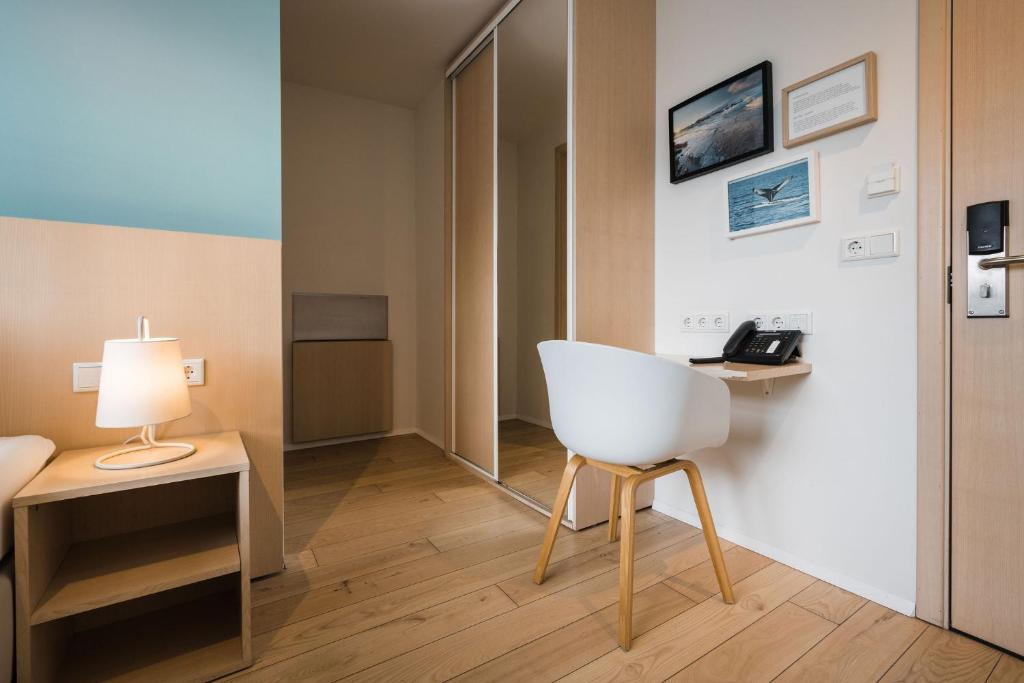 TV a/nebo společenská místnost v ubytování Reykjavik Lights Hotel by Keahotels
