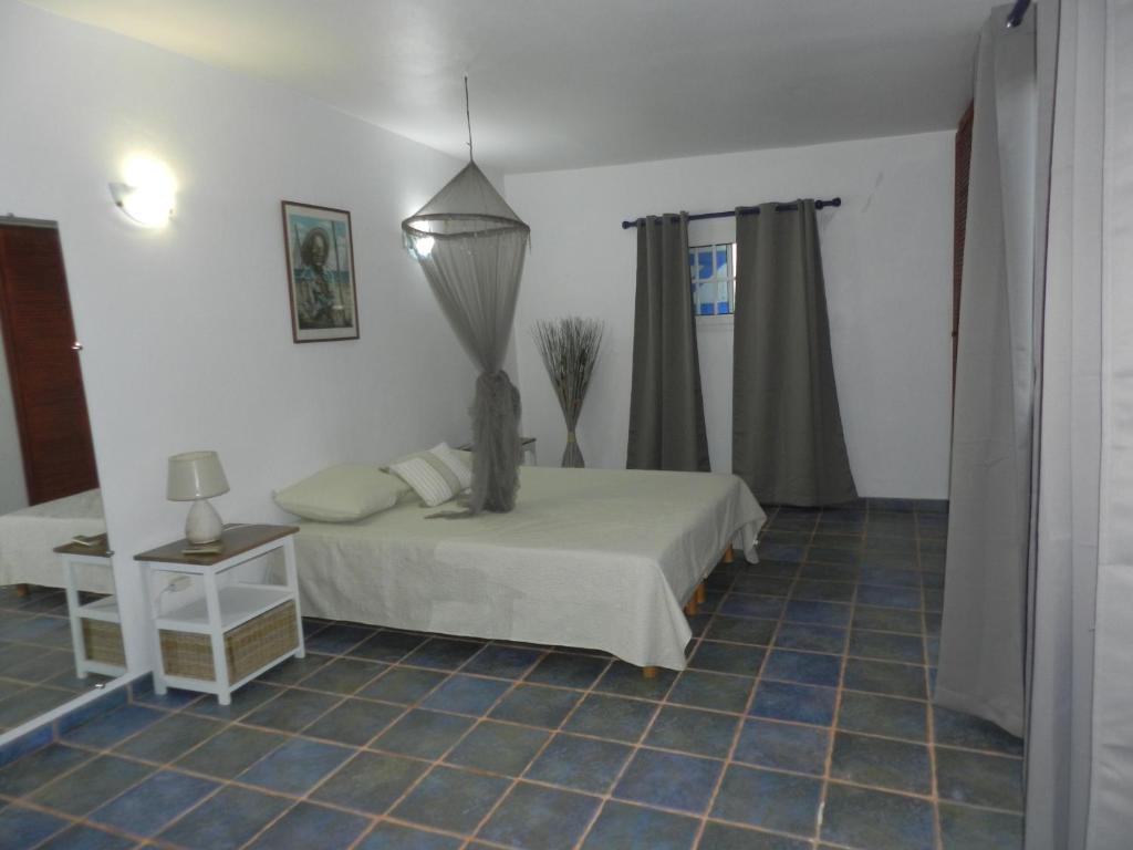 Postel nebo postele na pokoji v ubytování VILLA LE BORD BLEU