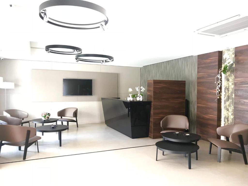 TV a/nebo společenská místnost v ubytování Hotel Vespucci