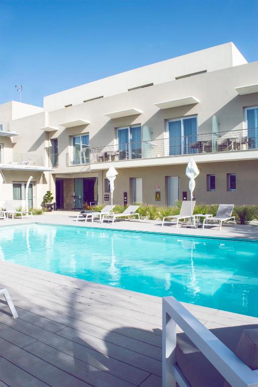 Bazén v ubytování Hotel Vespucci nebo v jeho okolí