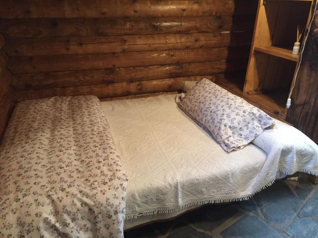 A bed or beds in a room at Cabaña - A Pastoriza - Lugo