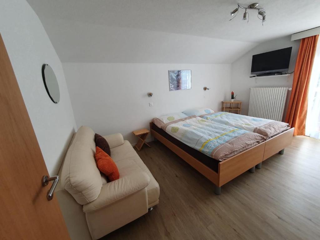 Postel nebo postele na pokoji v ubytování Apartmenthaus Holiday