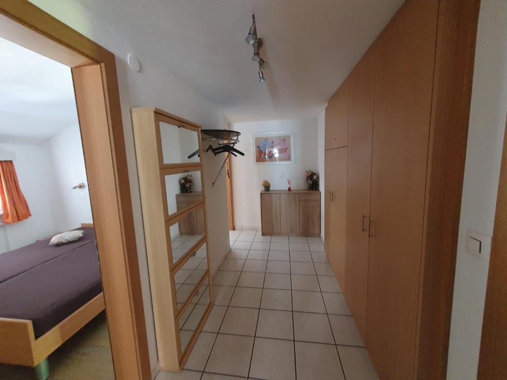 Postel nebo postele na pokoji v ubytování Apartmenthaus Holiday