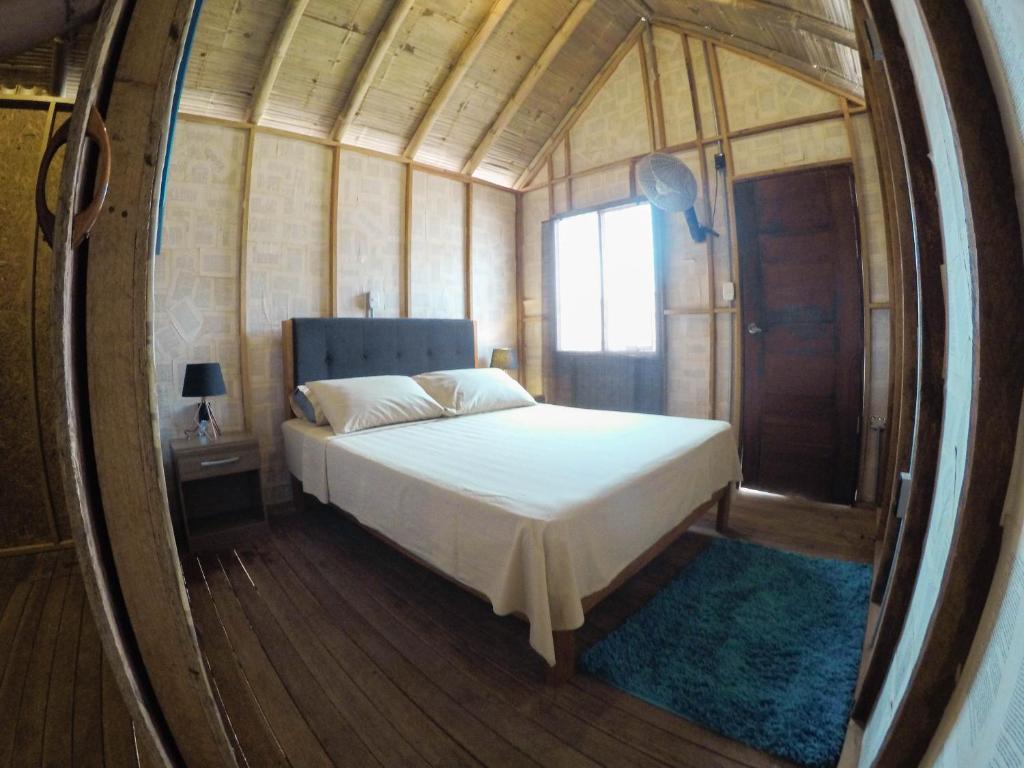 Voodi või voodid majutusasutuse Wild Rover Beach Mancora toas