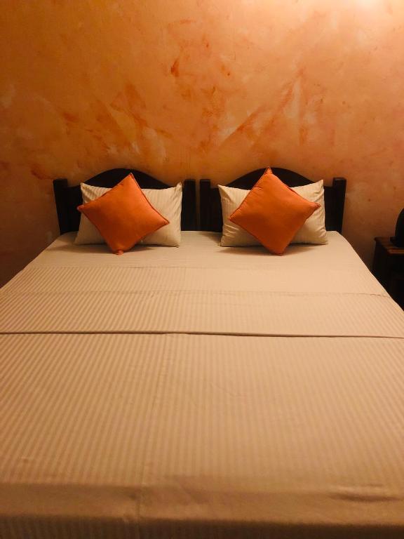 Postel nebo postele na pokoji v ubytování Fernando's Inn