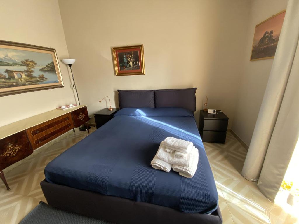 Postel nebo postele na pokoji v ubytování Terra Di Mare