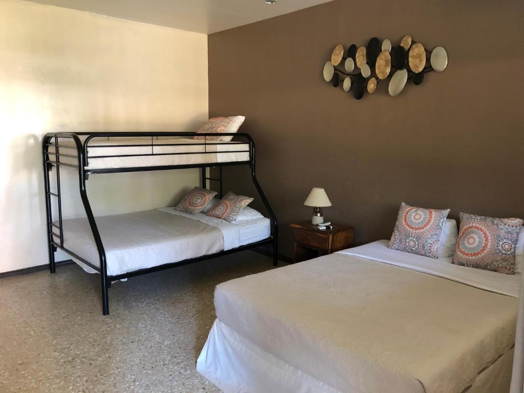 Postel nebo postele na pokoji v ubytování Hotel Diriá Santa Cruz