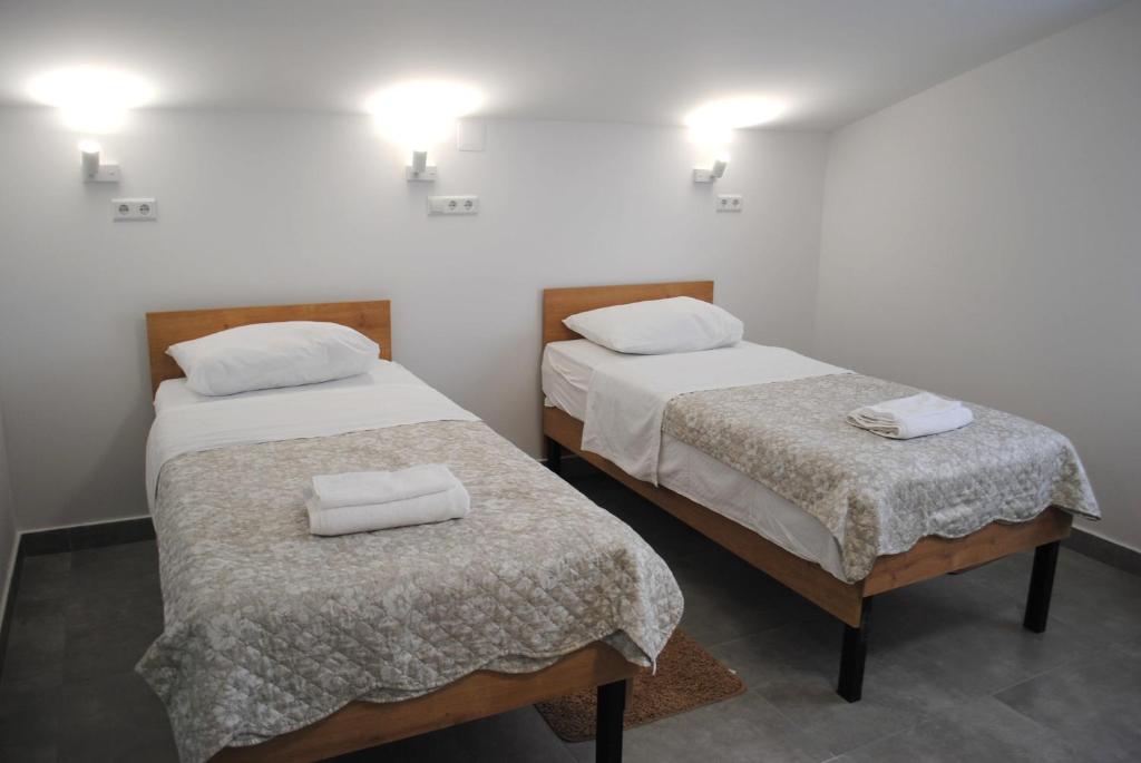 Postel nebo postele na pokoji v ubytování Hotel Fala Zagreb