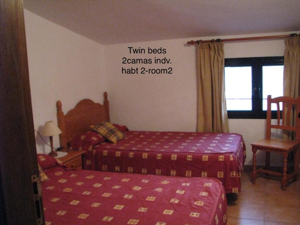 A bed or beds in a room at Casa GABO Mala-Lanzarote Norte