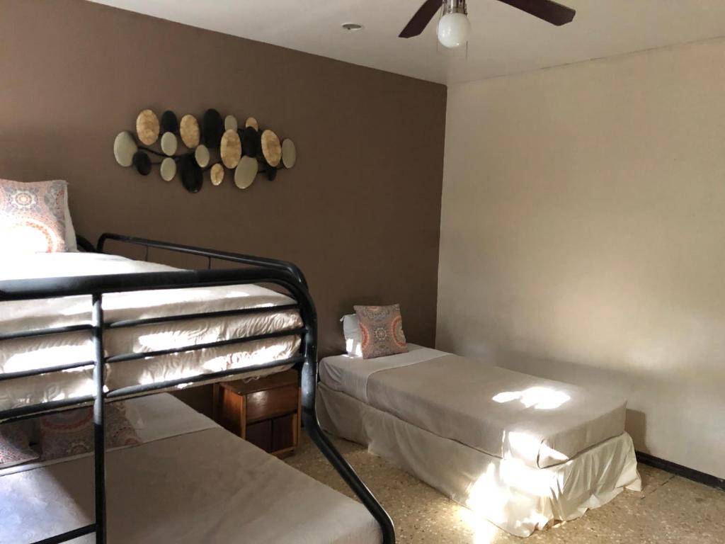 Postel nebo postele na pokoji v ubytování Hotel Diriá Santa Cruz