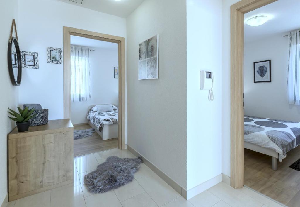Posteľ alebo postele v izbe v ubytovaní Iris beach apartments