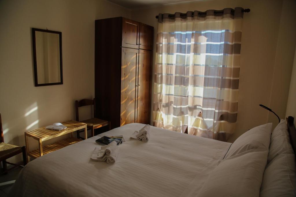 Posteľ alebo postele v izbe v ubytovaní Albergo Parco Gran Sasso