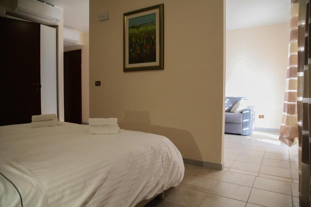 Posteľ alebo postele v izbe v ubytovaní Albergo Parco Gran Sasso