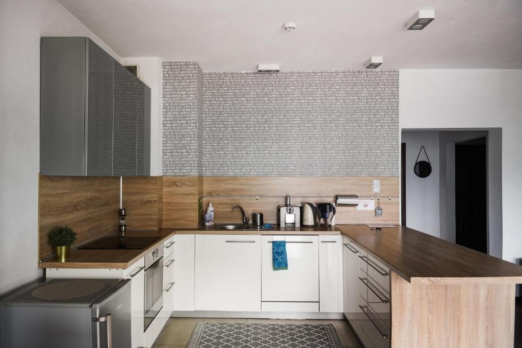 Kuchyňa alebo kuchynka v ubytovaní Apartament Myślenice