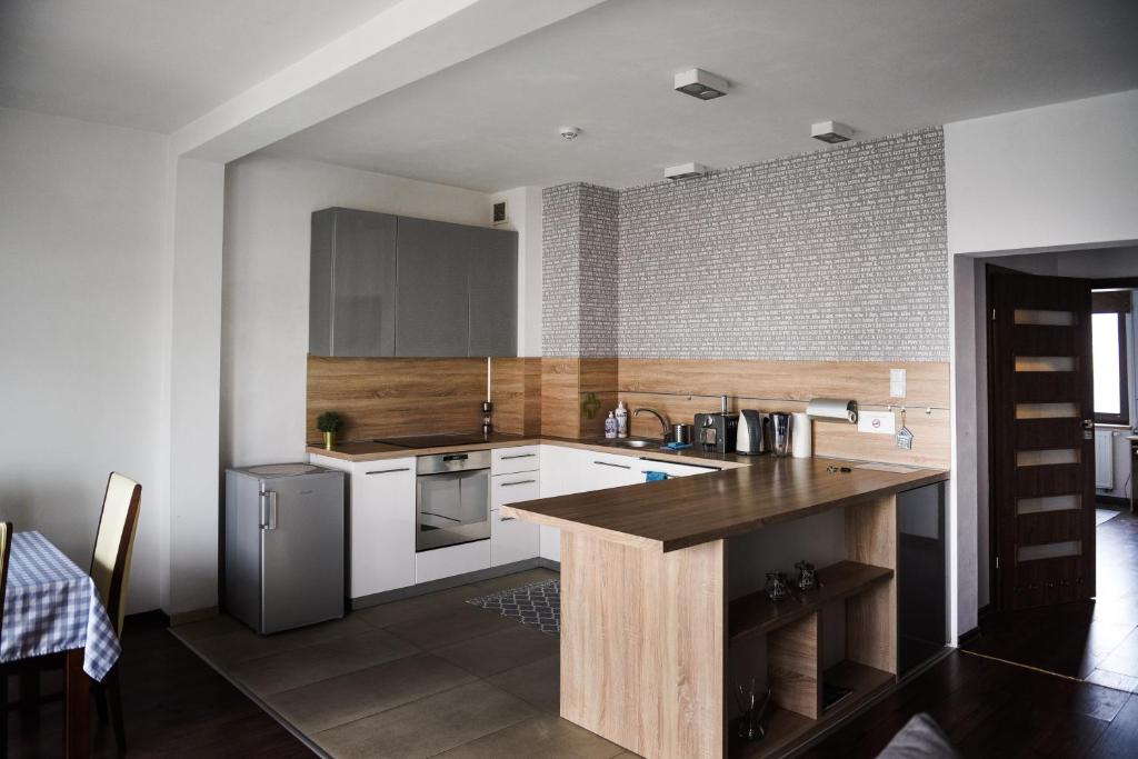 Kuchyňa alebo kuchynka v ubytovaní Apartament Myślenice