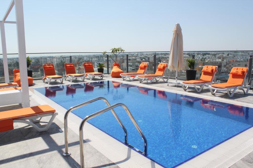 a swimming pool on the roof of a hotel at Sky Roof Hotel in North Nicosia