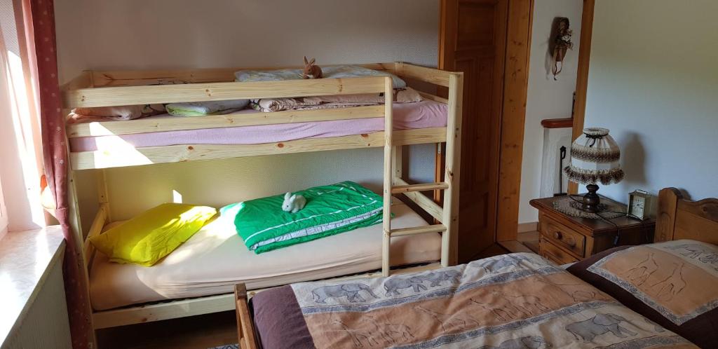 Postel nebo postele na pokoji v ubytování Ferienhaus Gemütlichkeit
