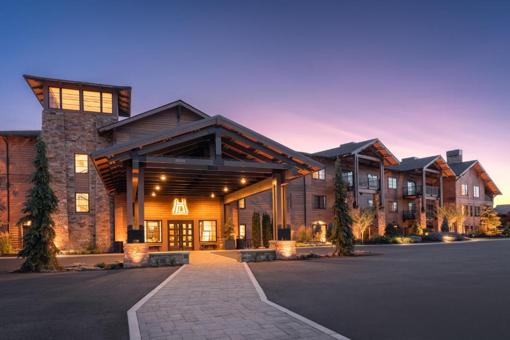a building with a parking lot in front of it at Pronghorn Resort in Bend