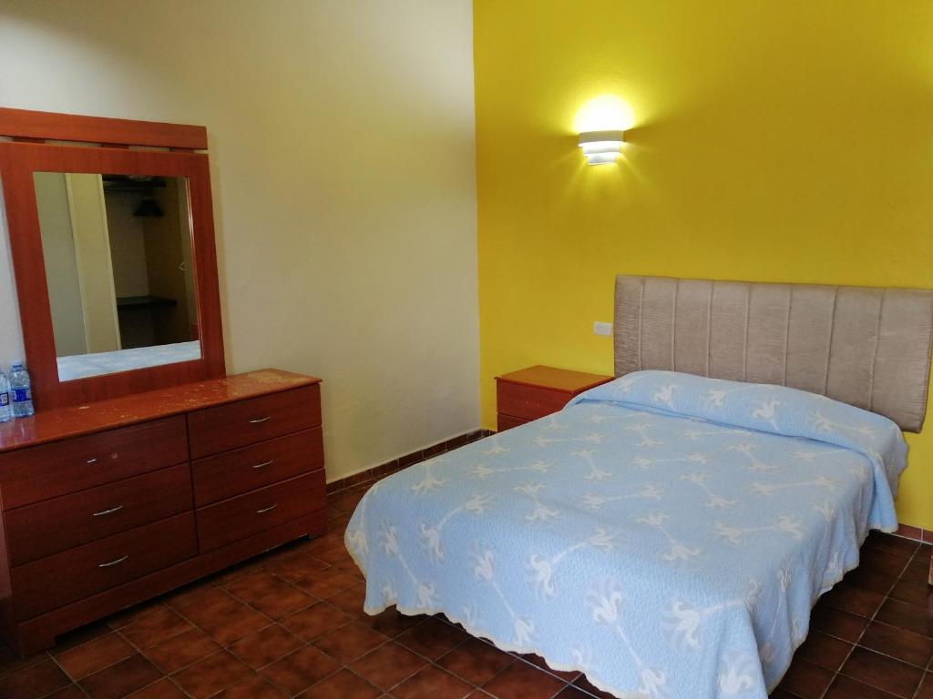 Postel nebo postele na pokoji v ubytování Hotel Tamuin