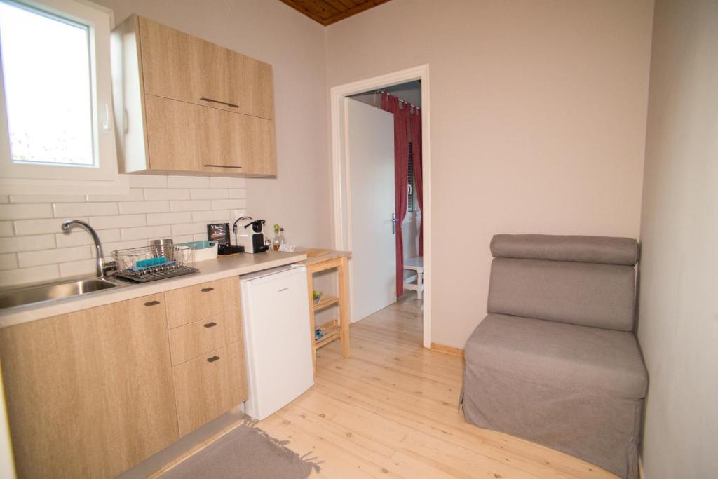 Kuchyň nebo kuchyňský kout v ubytování Tsonas Apartments