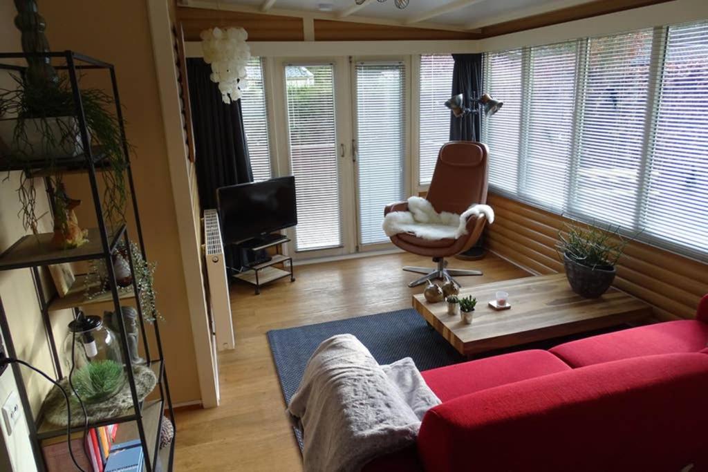 Posezení v ubytování vakantiehuis op de veluwe