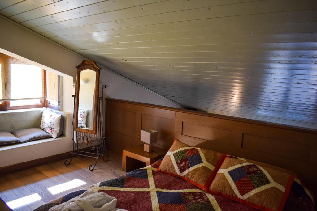 Postel nebo postele na pokoji v ubytování Guesthouse Vasiliki