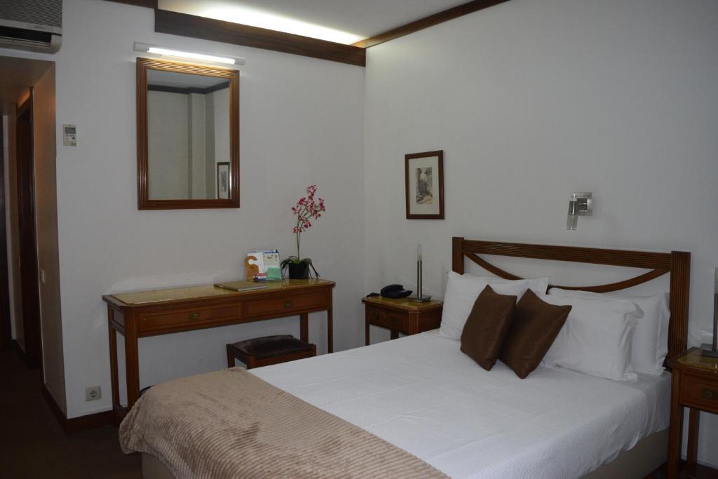 Postel nebo postele na pokoji v ubytování Hotel Dona Sofia