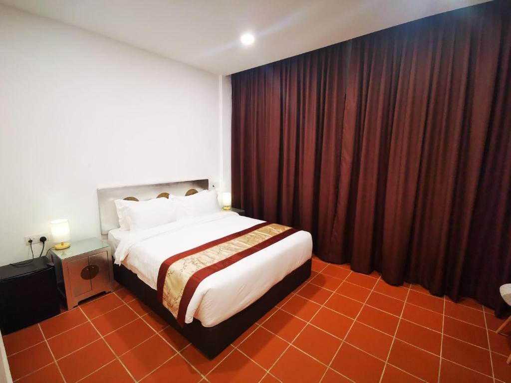 Mclane Boutique Hotel - Deluxe Zimmer Mit Queensize-Bett